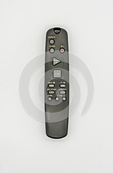 Universal remote control isolated on white. Old and dirty music station remote controller