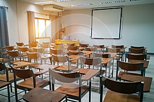 University classroom with wooden chairs