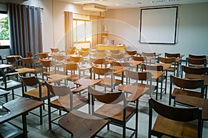 University classroom with wooden chairs