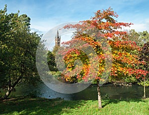 The University of Glasgow from Kelvingrove park on a sunny autumn day