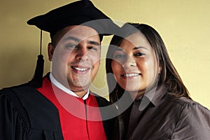 University graduation celebrates his success with his girlfriend