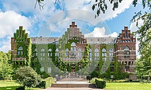 University library building covered in ivy, Lund, Sweden