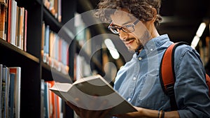 University Library: Portrait of Focused and Talented Hispanic Boy Wearing Glasses with Picked Book