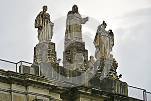 University of Santo Tomas main building facade church leaders statue