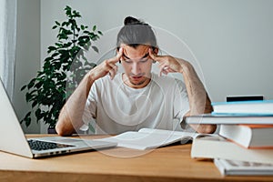 University student studying and making notes at campus