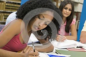 University student working in library