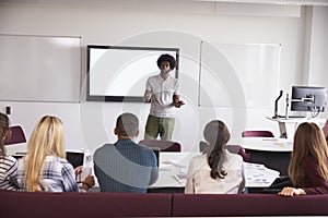 University Students Attending Lecture On Campus