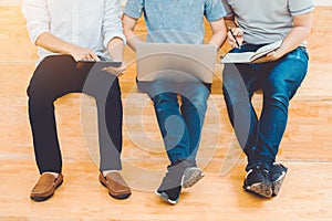 University students or college students studying and reading together in library