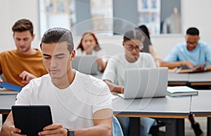 University, students and learning with laptop or tablet for digital notes in education auditorium. Concentration, focus