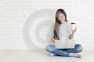 University students are smiling and using laptops , Self Study concept photo