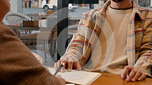 University students studying together at table