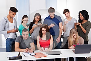 University students using mobile phones