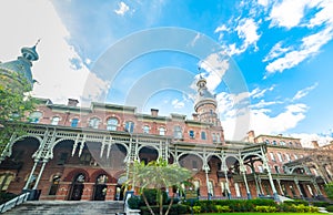 University of Tampa under a blue sky with clouds