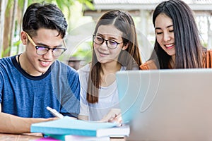 University young group students sitting doing consult together