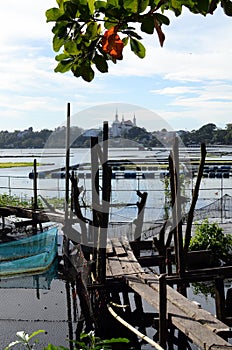 Unkempt, weather damaged lake foot bridge environmental issues that destroy lake