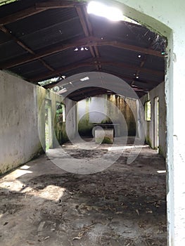 Unkept prayer room in Guatemala cemetery photo