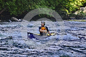 Unknown canoeist, whitewater canoeing at the Minden Wild Water Preserve.