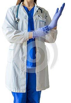 Unknown female doctor in medical uniform putting sterilized surg