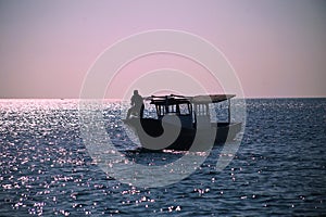 Unknown fishing boat in the sea