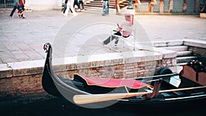 Unknown gondolier awaiting passengers in Venice, Italy