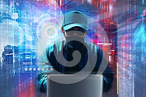 Unknown hacker use laptop on binary code background