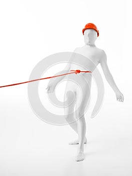 Unknown man tide by an orange rope