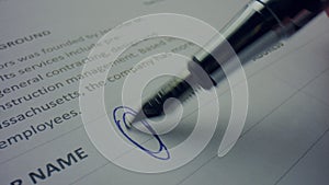 Unknown person signing document with pen. Worker using nibbed fountain pen