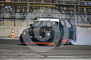 Unknown rider on the car overcomes the track