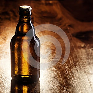 Unlabeled brown bottle of beer