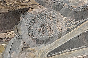 unloading and backfilling process with waste material at mine dump