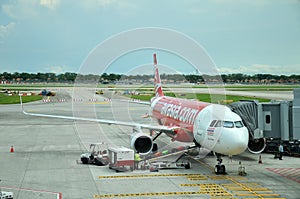 Unloading of baggage from the Air Asia aircraft