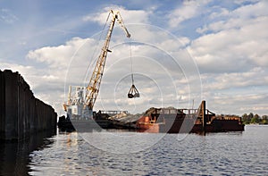 Unloading the barge.