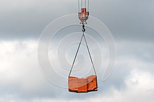 Unloading of building materials by crane