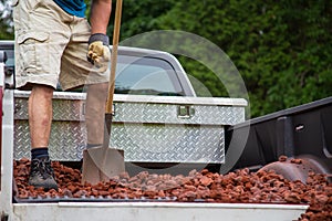 Unloading lava stone from truck