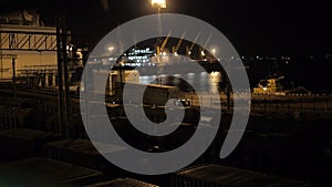 Unloading sulfur in trading seaport at night in Odessa, Ukraine.