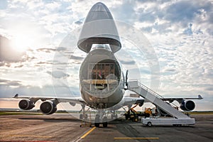 Unloading widebody cargo aircraft photo