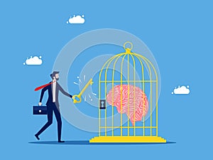 Unlock your freedom of thought. Businessman unlocks the brain in the cage