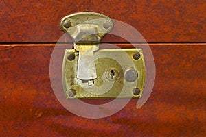 Unlocked Brass Latch on Vintage Luggage