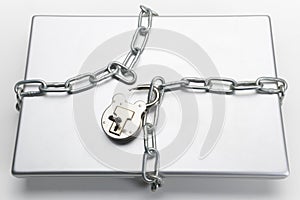 Unlocked padlock and laptop