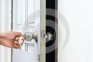 Unlocking and opening door with key