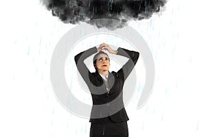 Unlucky businesswoman with a black cloud full of rain over her head