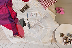 Unmade bed with a blanket