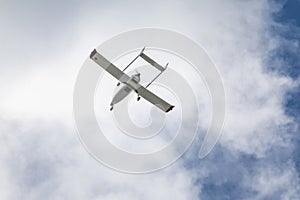 Unmanned aerial vehicle UAV in blue sky. photo