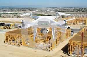 Unmanned Aircraft Quadcopter Drone Flying and Inspecting Construction Site