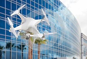 Unmanned Aircraft System UAS Quadcopter Drone Near Office Building