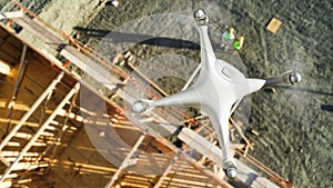 Unmanned Aircraft System UAV Quadcopter Drone Above Construction