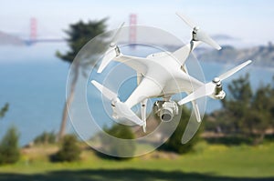 Unmanned Aircraft System UAV Quadcopter Drone In The Air Near