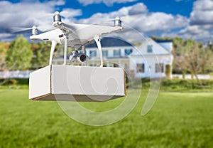 Unmanned Aircraft System UAV Quadcopter Drone Delivering Package
