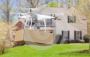 Unmanned Aircraft System UAV Quadcopter Drone Delivering Package To House