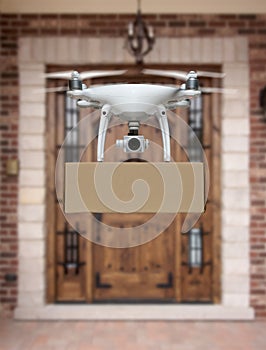 Unmanned Aircraft System UAV Quadcopter Drone Delivering Package To House